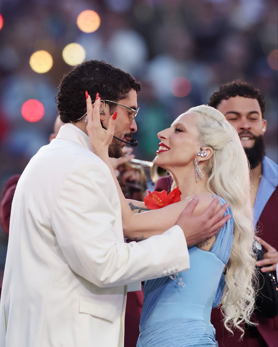 extratv's tweet photo. Lady Gaga delighted fans with a surprise feature during Bad Bunny’s #SuperBowlLX #AppleMusicHalftime Show! 🫶🎶 Gaga sang a Latin-infused rendition of her Bruno Mars duet “Die with a Smile.” See more 🔗: https://t.co/QyQWsqOV9c https://t.co/ANtKmJorAh