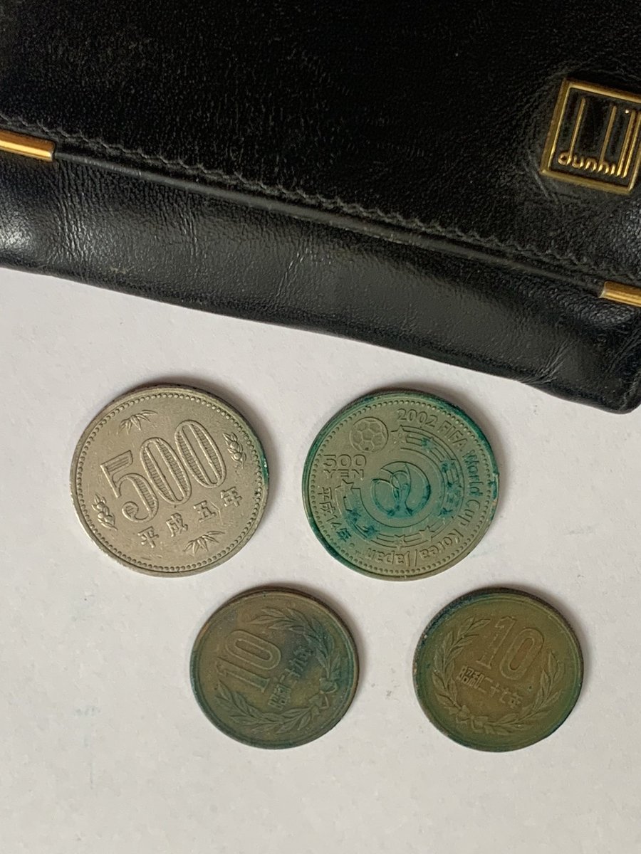mk4s70's tweet photo. 整理中に出てき小銭入れの中から、
青緑に変色した、2002 ワールドカップの500円等が出てきた🤣 https://t.co/Mt2cYG3W81