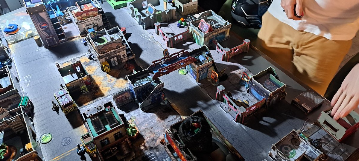HCMCityInfinty's tweet photo. Our local store moved spots. During the construction they setup a table outside. We played in front of the shop. Def had a lot of curious people stip by to watch us play. It was fun plating outdoors. Bakunin vs Dashat. Bakunin wins on classified objectives. #infinitythegame https://t.co/sIIxL1JrdW