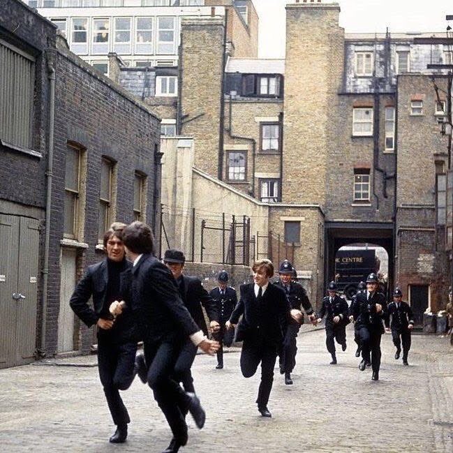 With the old bill in hot pursuit, during the filming of a scene from A Hard Day’s Night, London 1964.
