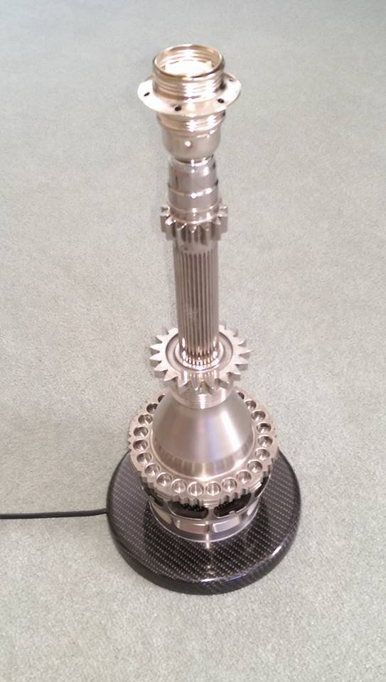 ColinCyclone's tweet photo. @artiF1ed A lamp that I made with a Honda BAR layshaft and Hub. https://t.co/hjWrFLLzvG