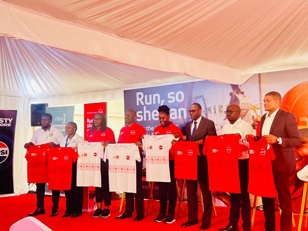 BakaimaGroup's tweet photo. Together with @AbsaUganda and partners, we launched the KH3-7 Hills Absa Run 2026 kit, supporting girl child education for the 4th year. Our team represented by our GM – Affordable Housing @TheOwoyesigire pledged two land titles for male &amp; female winners. #Run, so she can. https://t.co/0CGJe2WKvZ