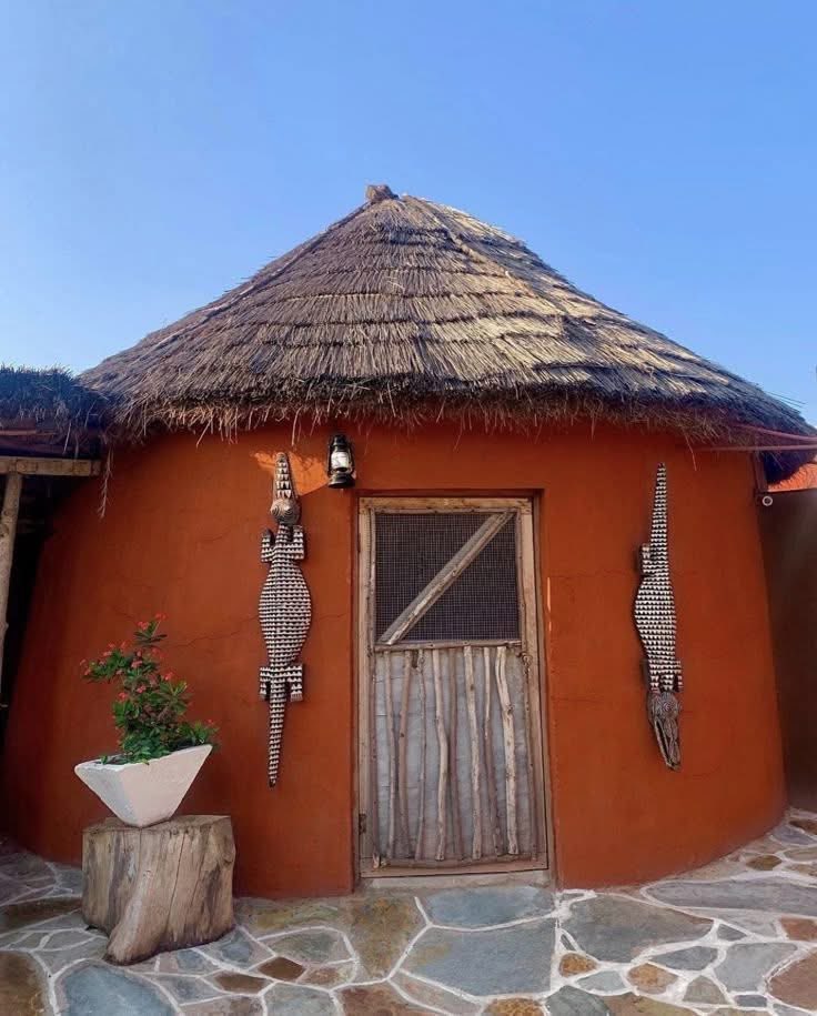 Joe__Bassey's tweet image. As an African, never be ashamed of mud houses in our villages, because they have thermal insulating properties that are favorable to our climate and environment.