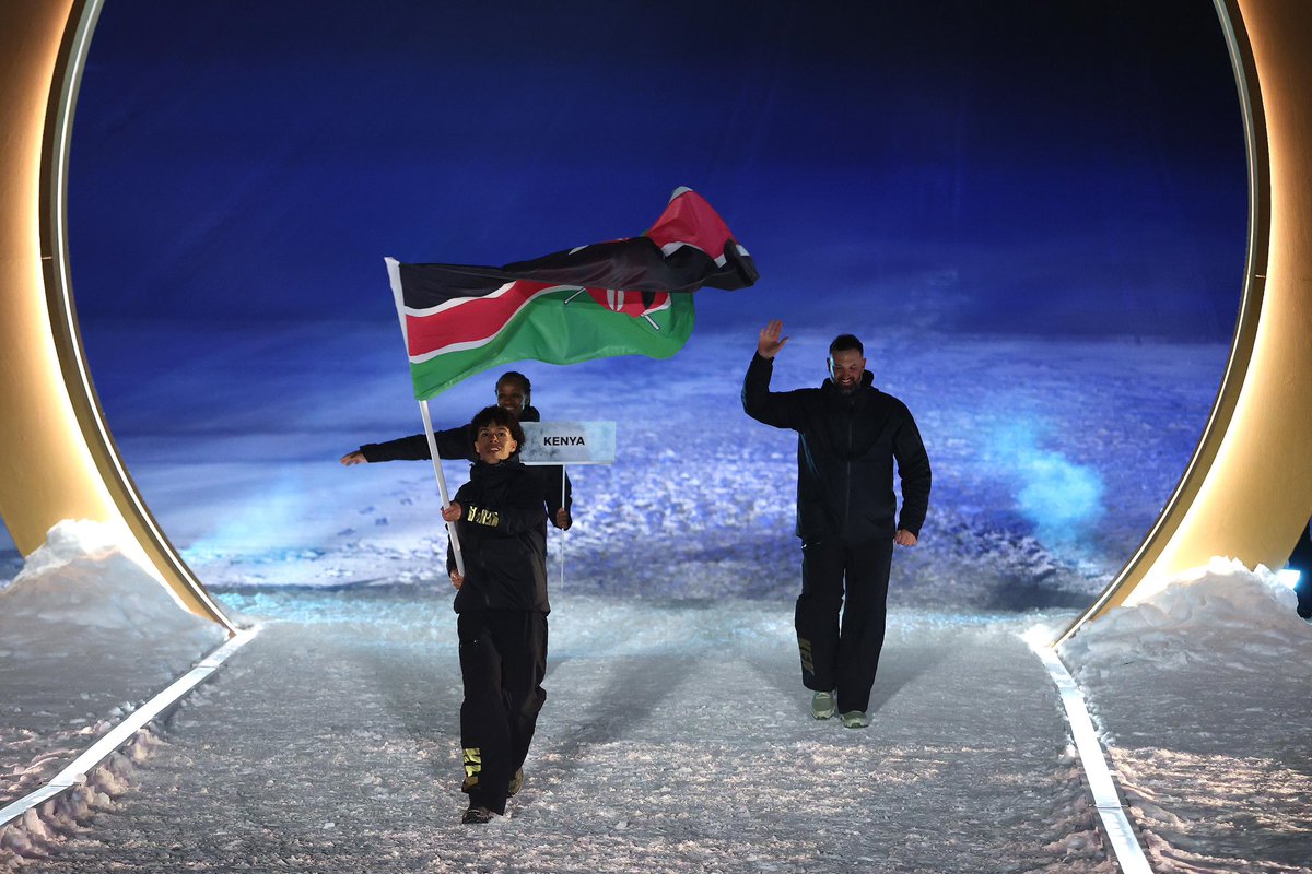 OlympicsKe's tweet photo. Dear Kenyans, on Valentines’ day something special will happen. A special kind of love.❤️

As the Winter Games go on in Milano Cortina, a special 18 year old, Issa Laborde will be  lifting our flag high in the cold mountains of Italy. A boy with hopes, dreams and a passion. His smile tells it all at the opening ceremony

Yes, that’s his mother, and his coach. 
Proudly pushing him as he prepares for competition on 14th February. 

This is our pride. Our athletes. Our flag. 🇰🇪
