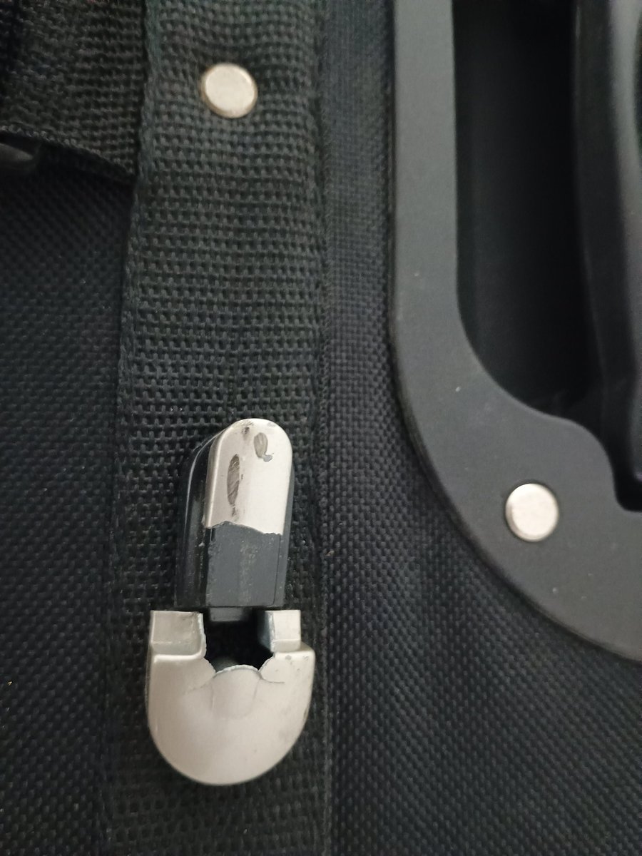 MsMeganFitz's tweet photo. Never flying @united again - on a severely delayed cross-country flight where we ultimately changed planes due to mechanical issues, they only put Priority bags on our new aircraft and routed my checked bag through Denver, breaking the handle in the process (1/?) https://t.co/5oOYAYQGGM