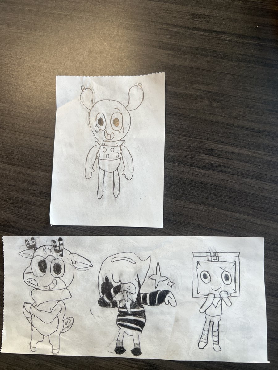 Splatoonplushie's tweet photo. They won't let me use my phone for artistic references, so I printed out some pictures for me to draw from. Drew my first human yesterday and experimented with shading. I feel like I'm improving. https://t.co/9NxkP4XJIo