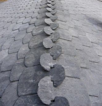 Sculpted by hand, sealed by nature. A timeless display of expert slate craftsmanship.