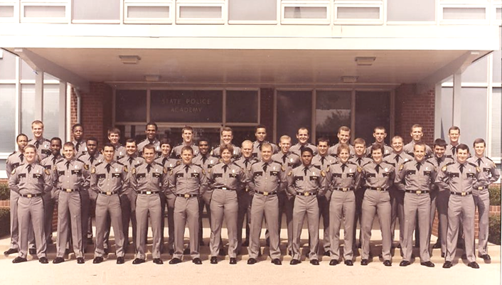 He served more than 30 years in law enforcement, including three years at KSP and 27 years with the Jefferson County Police, which merged into the <a href="/LMPD/">LMPD</a>, rising to the rank of Major and serving as Special Operations Division Commander. (2/3)