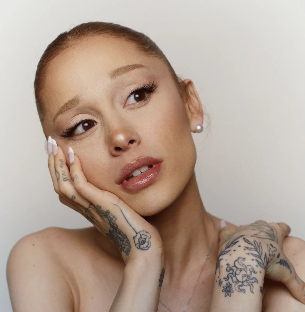 PopCrave's tweet photo. Ariana Grande re-shares Bad Bunny’s #SuperBowl Halftime Show. https://t.co/815T4pQGWz