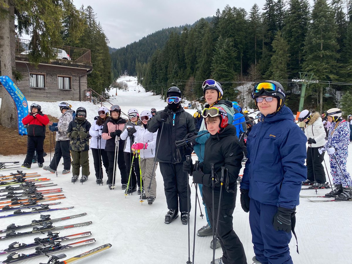 Successful first day skiing, smiles and tired legs all round! Image