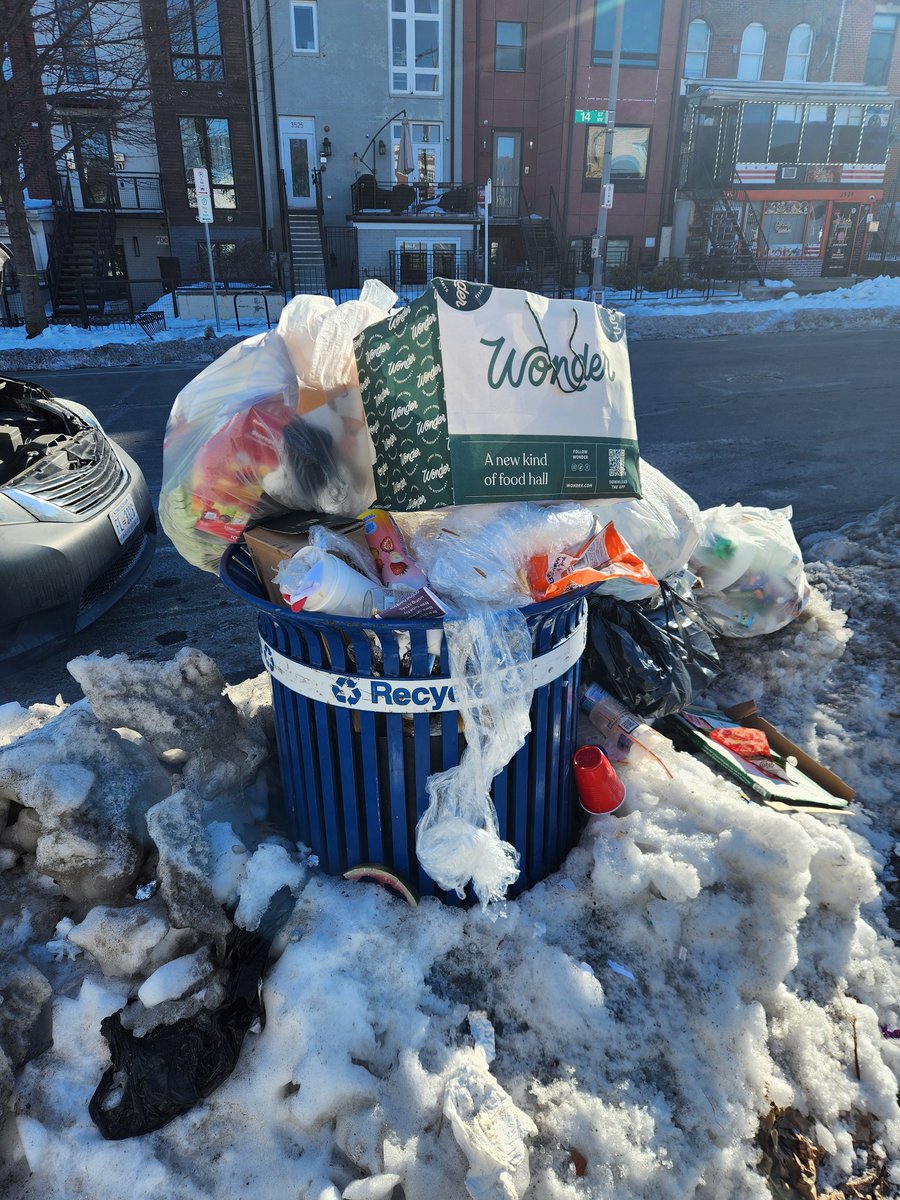 Wildly overflowing public can at the corner of 14th Street NW and Parkwood Pl NW <a href="/311DCgov/">DC311</a>