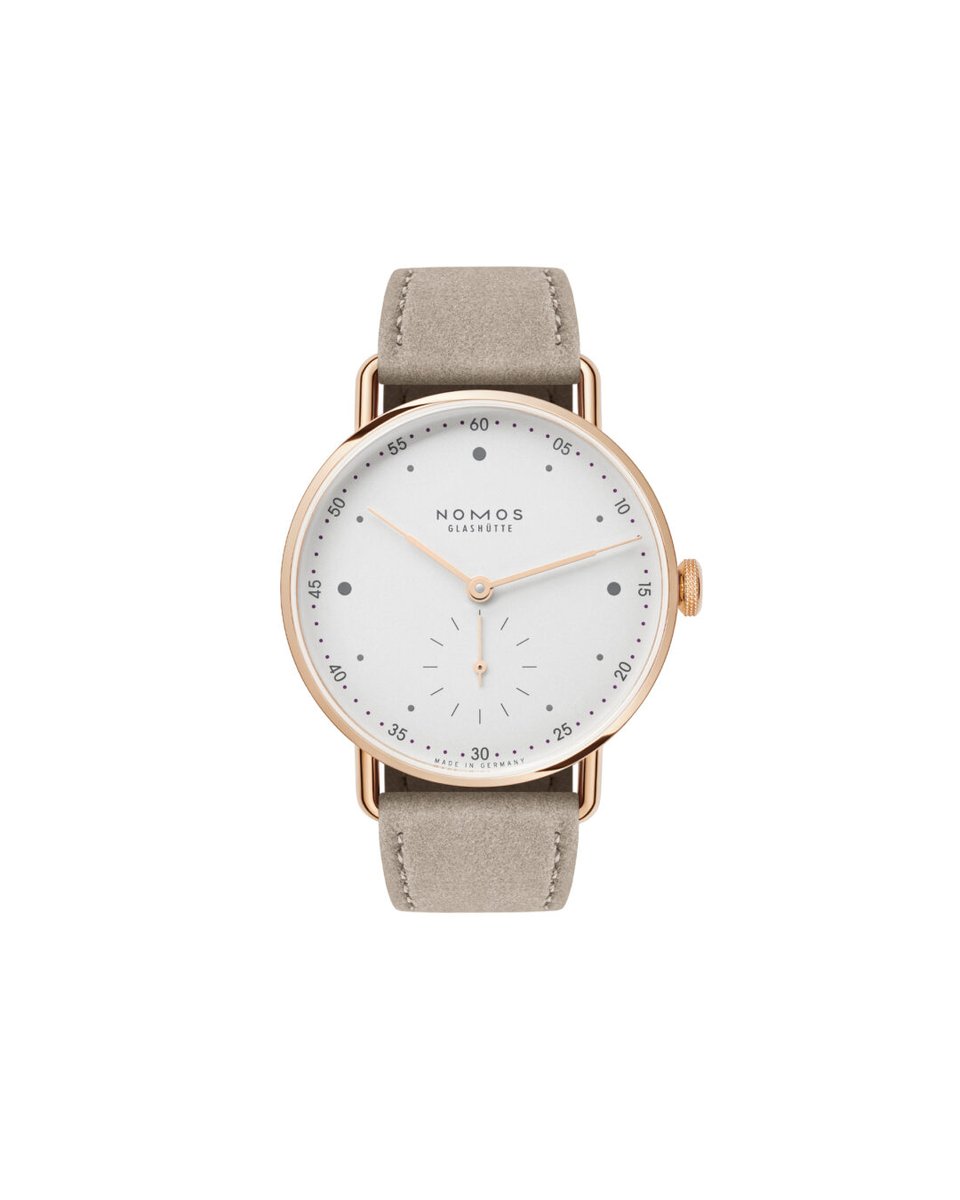 nomosglashuette's tweet image. Your next favorite #timepiece: #Metro rose gold 33. This #dresswatch features a white silver-plated dial with subtle grey and purple accents. Crafted from solid #rosegold, its case and hands add an extra touch of elegance – yet remain fresh and modern. 

nomos-glashuette.com
