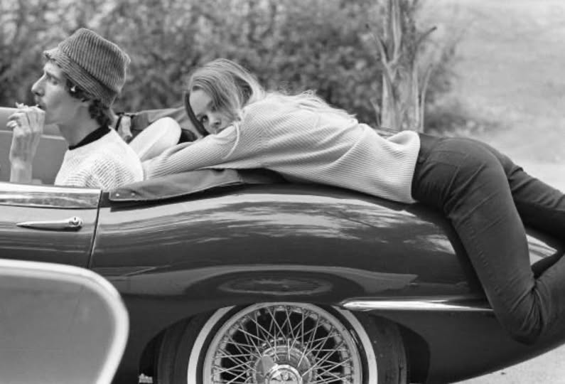 FilmsQuirky's tweet photo. #TakingABreakFromFilming  
Musicians #JohnPhillips  #MichellePhillips (The Mamas &amp; the Papas) with their Jaguar E-Type 🚘 in Los Angeles, CA (1967). https://t.co/jSJObUZmoI