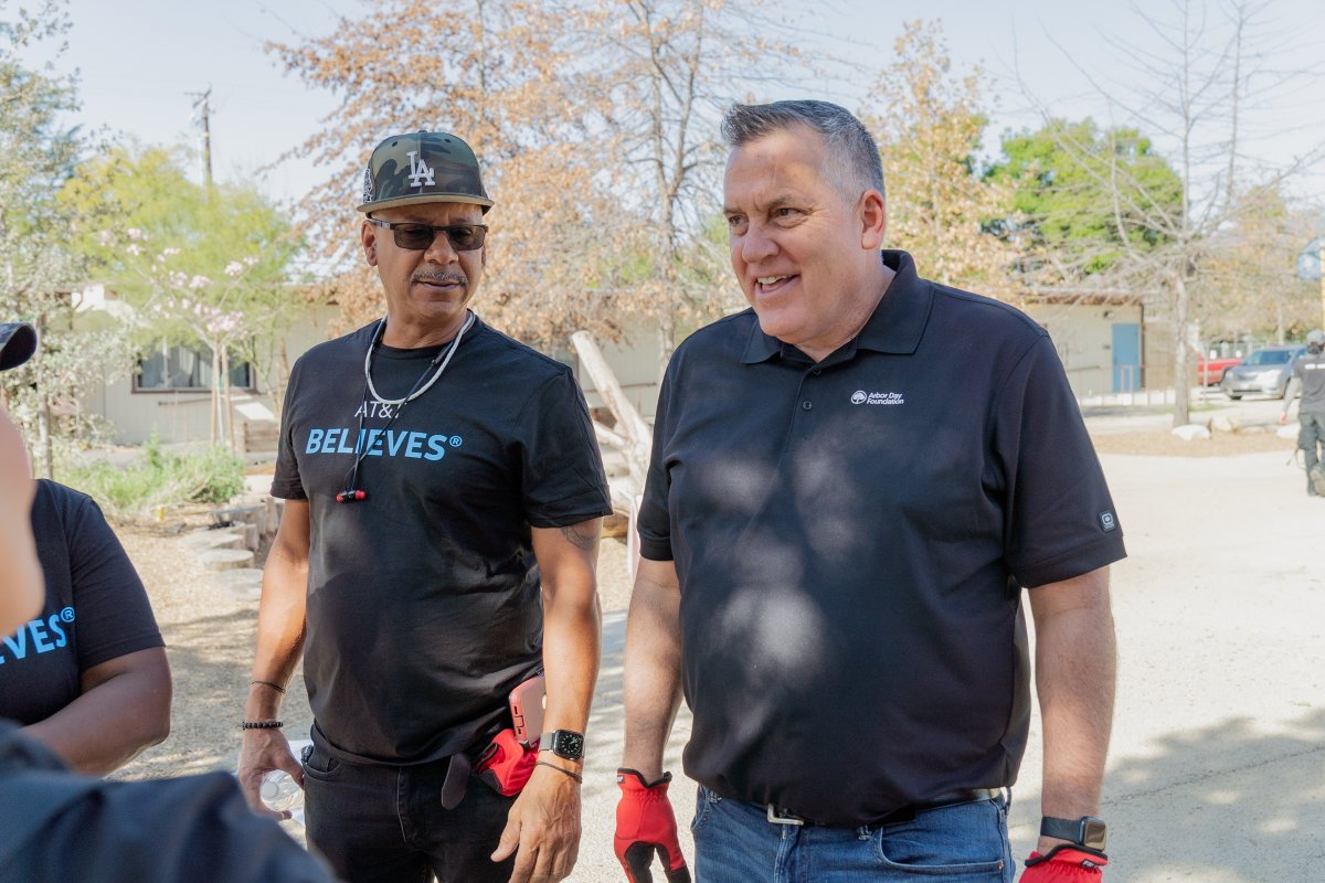 DanLambe's tweet photo. One year after the Eaton &amp; Palisades Fires, the scars remain in LA County, but so does hope.

At an Altadena-area school in the burn zone, we planted trees with @amigosrios and generous partners to help restore a space for students. https://t.co/w5imPy0lIW