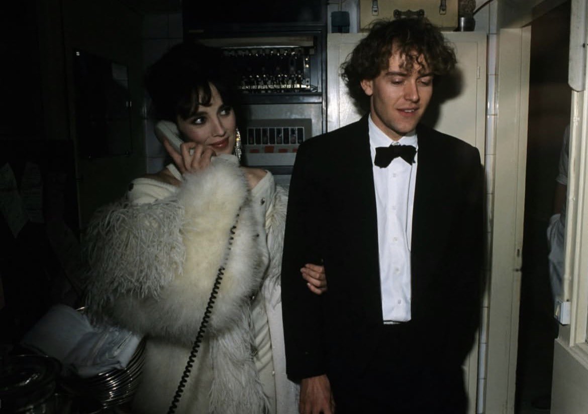 isabelle adjani and hervé guibert at the 1984 césars 

hervé guibert writer of the screenplay 'geminga' (aka le livre noir) about the feud between the isabelles