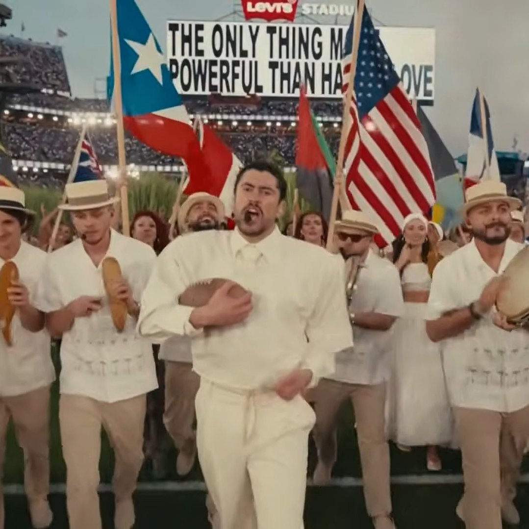 ChromeBarracuda's tweet photo. Bad Bunny overcomes his origin and steps into the future as an American Imperial subject

Meanwhile, the Untermensch halftime show opens with: 
"I just wanna catch my fish, drive my truck, drink my beer
 Not wake up to all this stuff I don't wanna hear" https://t.co/RP0IQ4QV44