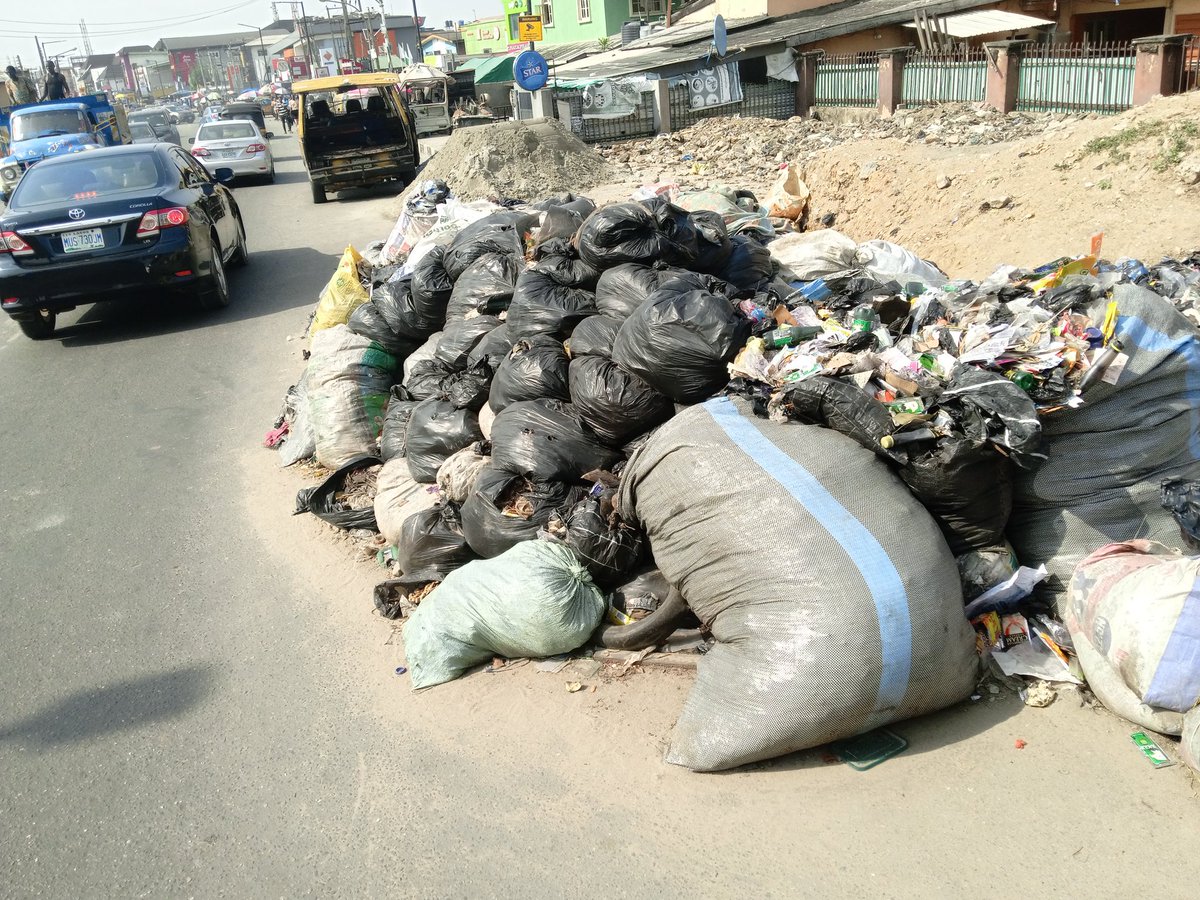 Since the government monuments at the New Garage Roundabout Busstop, trades, butchers and fruit sellers in the mini market moved their dump spot to this place (behind RCCG Maranatha Car Park). It takes using one person as a scape goat for all to learn from. #waste @lawma