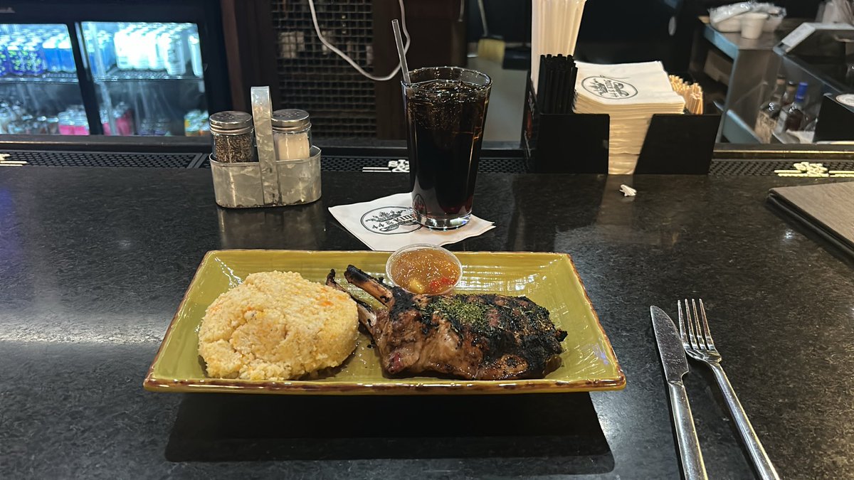 Shootereagle's tweet photo. 44th and King Pork Chop! With sweet potato grits! @FoodNetwork talking to a couple from Boston and they love it down here away from the snow! https://t.co/d67fmZwf1S