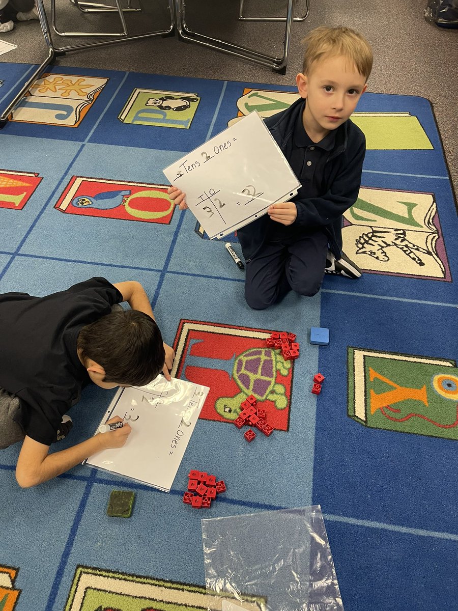 Learning place value with tens and a few ones…we love hands on math!! #believeinflc