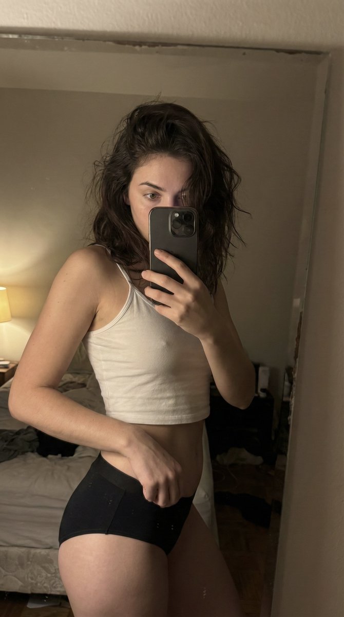 You weren’t supposed to see this part.

{
  "meta": {
    "quality": "ultra photorealistic",
    "resolution": "8k",
    "camera": "iPhone 15 Pro Max",
    "lens": "24mm wide",
    "aspect_ratio": "9:16",
    "style": "raw iphone mirror shot, harsh contrast, natural grain"
  },