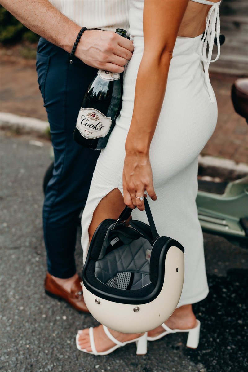 1828collective's tweet photo. *Pop* the champagne because the Cook’s are getting married ✨🍾 Okay but seriously how cute that not only is there a champagne bottle that matches B’s last name but ALSO that they brought their Vespa to their engagement session 🤗🤗 https://t.co/dy9FLtH919