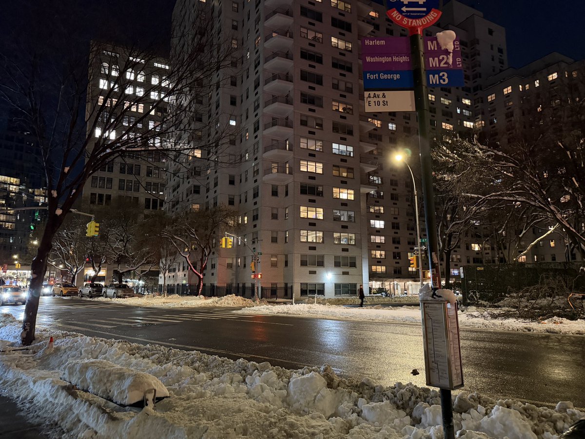 GoqueGroove's tweet photo. Love you mayor @NYCMayor and it’s rough to be hit the two snowstorms…but, the bus stops, really? This is 10th St. and 4th Ave. How the heck are folks supposed to get on and off? The city providing Everest summit gear??? @NYCSanitation https://t.co/XXjoW9Q886