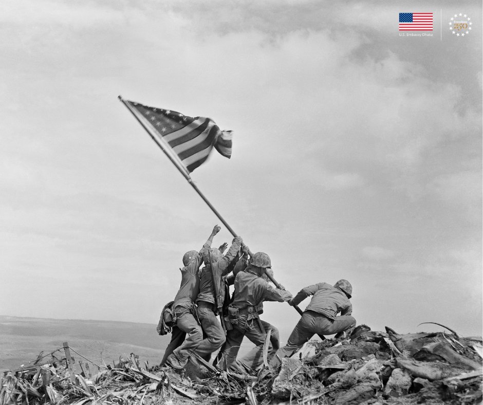 usembassydhaka's tweet photo. On this day in history this famous photo was taken of American Marines raising the flag on Iwo Jima. America continues to be a leader in bringing freedom to the world. https://t.co/Gq3Y984yRR