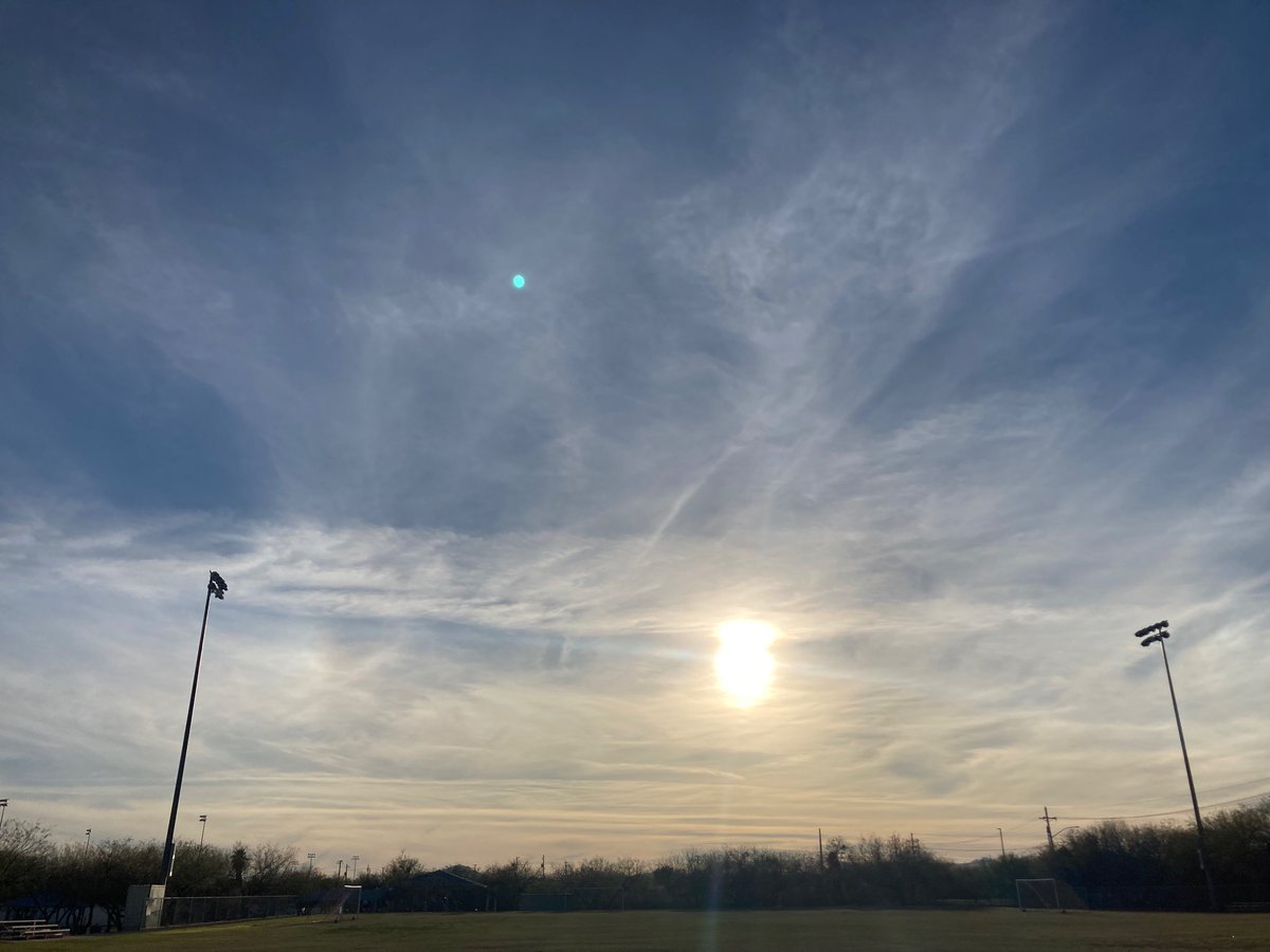 pepeshopenhauer's tweet photo. Heavy spraying has begun. Not sure what is causing the double sun effect but the sunlight burns, like sunlight thru a magnifying glass the particles being sprayed increase the heat https://t.co/ZzbUo5FzQz