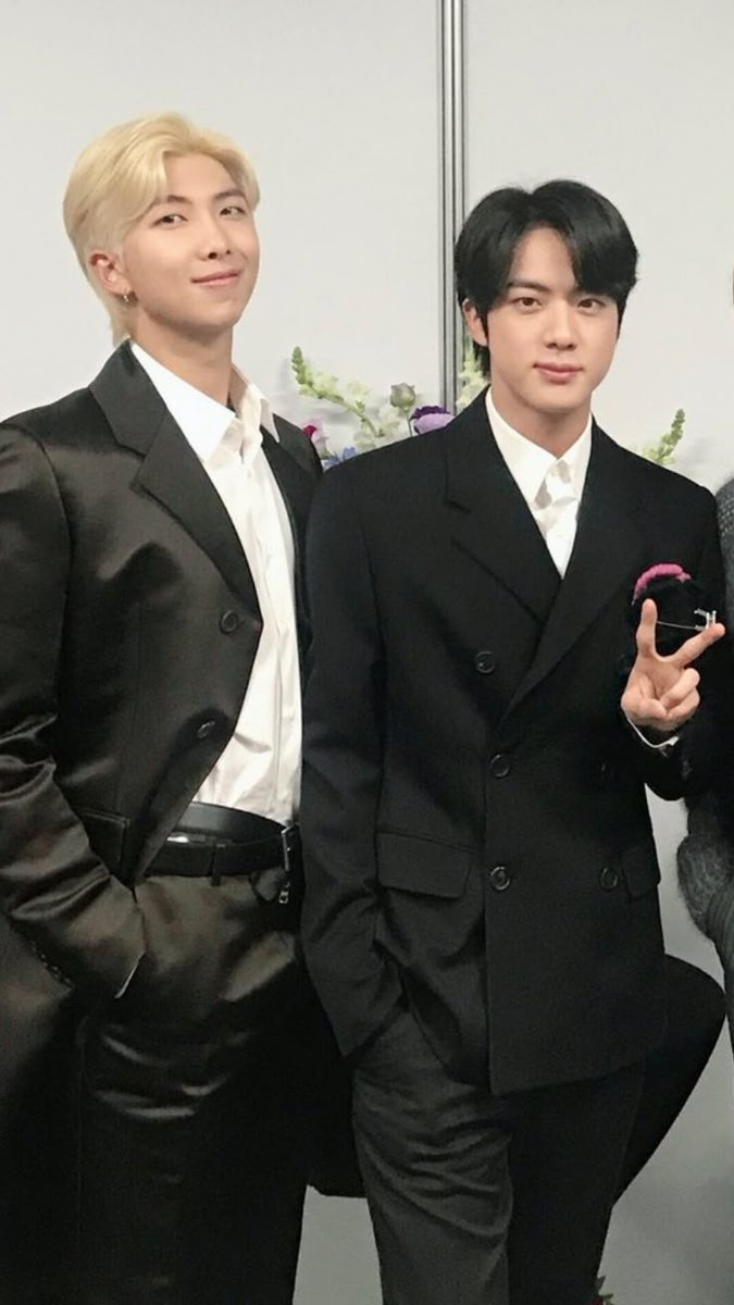 my fav namjin pose is when joon stands next to jin,but like his hips are touching jin in some way
