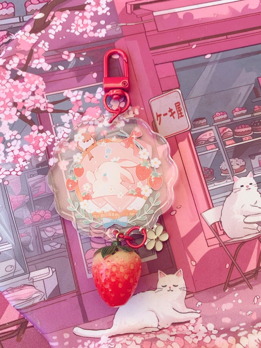 this keychain made by califlair 
is honestly so god tier..

the cute bunny, the glitter, the red colors,, AND THE STRAWBERRY?? 

instant love >W<