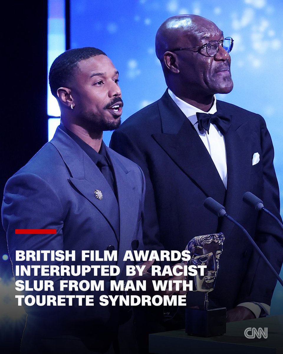 cnni's tweet photo. It was the clip heard around the world after Sunday night's BAFTA ceremony in London — a man yelling a racist slur as two of the world's most celebrated Black actors, Michael B. Jordan and Delroy Lindo, presented an award on stage. https://t.co/2PxUfVe8cX https://t.co/Ro3QCEPLg1