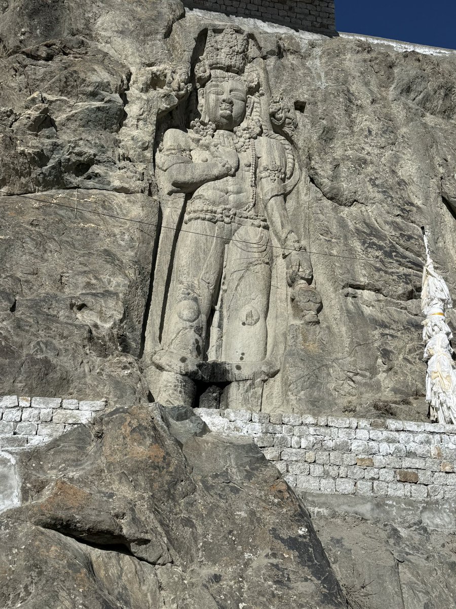 A unique rock cut sculpture of Maitreya Buddha in the style of Bamiyan Buddhas , at Karsekhar , Kargil in Ladakh . A story of generational heritage going back to centuries.