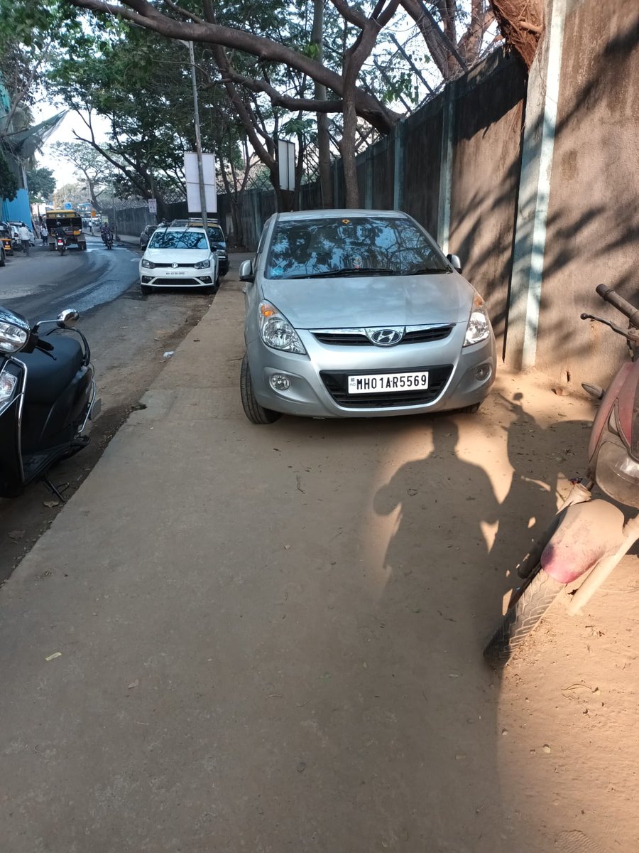 NIRANJANSANE1's tweet photo. @MTPHereToHelp @mybmc @MumbaiMetro3 @AshwiniBhide 
Car parked just on the footpath outside Bandra Colony Metro 3 station. Kindly take necessary action. https://t.co/SyZldL1Q0E