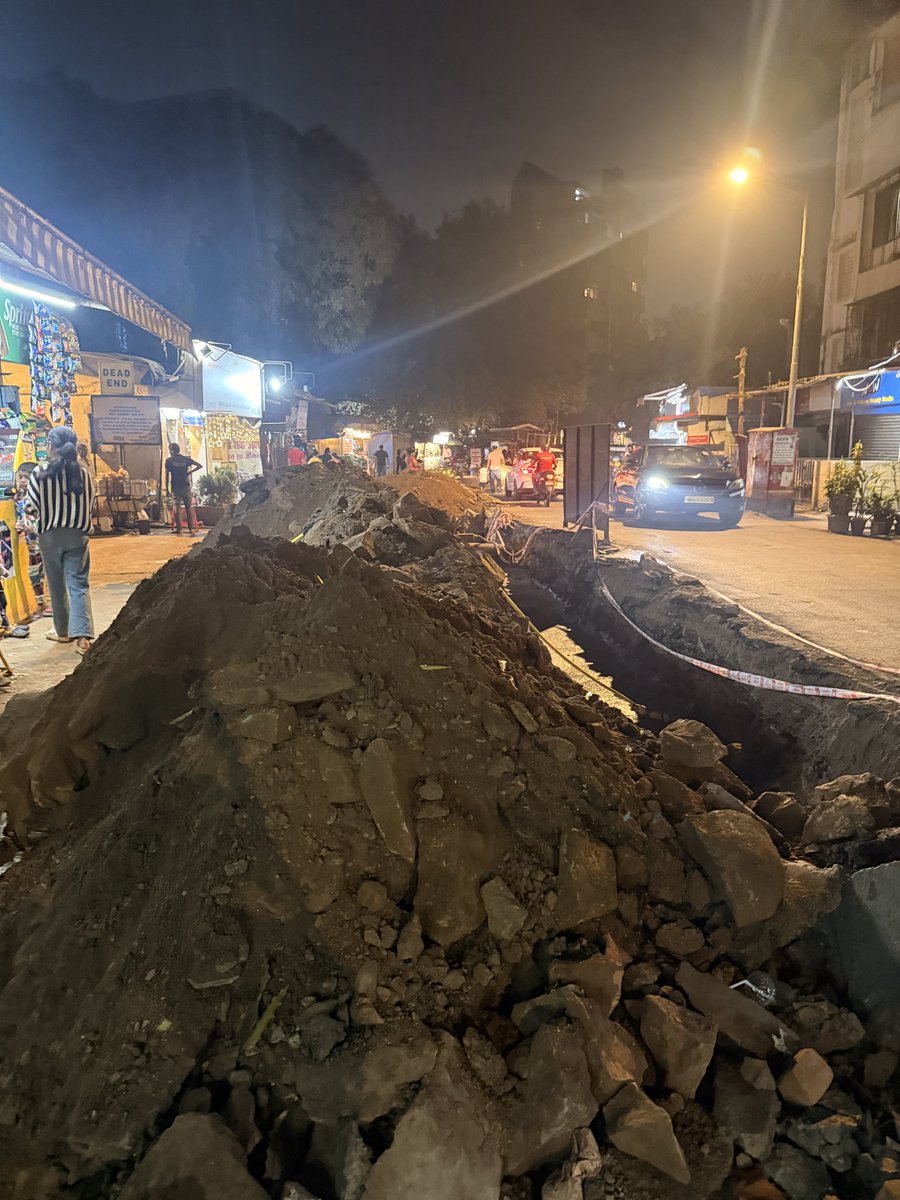 dhritea's tweet photo. The road near Juhu Road  Mukteshwar Devalaya Road has been dug for months.
Now on Saturday, the road near Chand Society (G P Chaudhary Lane) was suddenly dug again with zero prior notice. No vehicle could enter or exit the building. https://t.co/oIagTk4z3F