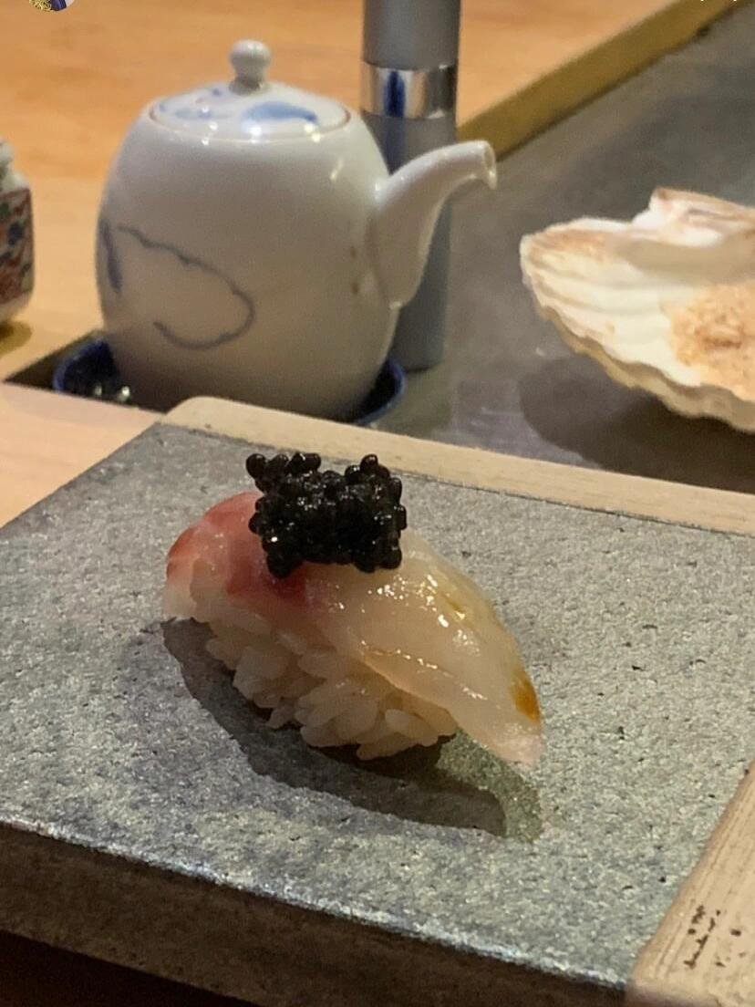 MisschTLVS's tweet photo. Translucent, slightly pink fish slices cover vinegared rice, topped with a small dollop of black caviar, adding layers of flavor and umami. https://t.co/6Htu4Wc1o9