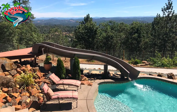 🏞️Slide into stunning views with Paradise Slides! Imagine zipping down this custom twist, overlooking lush forests, rolling mountains, and endless horizons—every descent feels like an adventure with nature as your backdrop. Turn your backyard into a scenic paradise! Who's ready