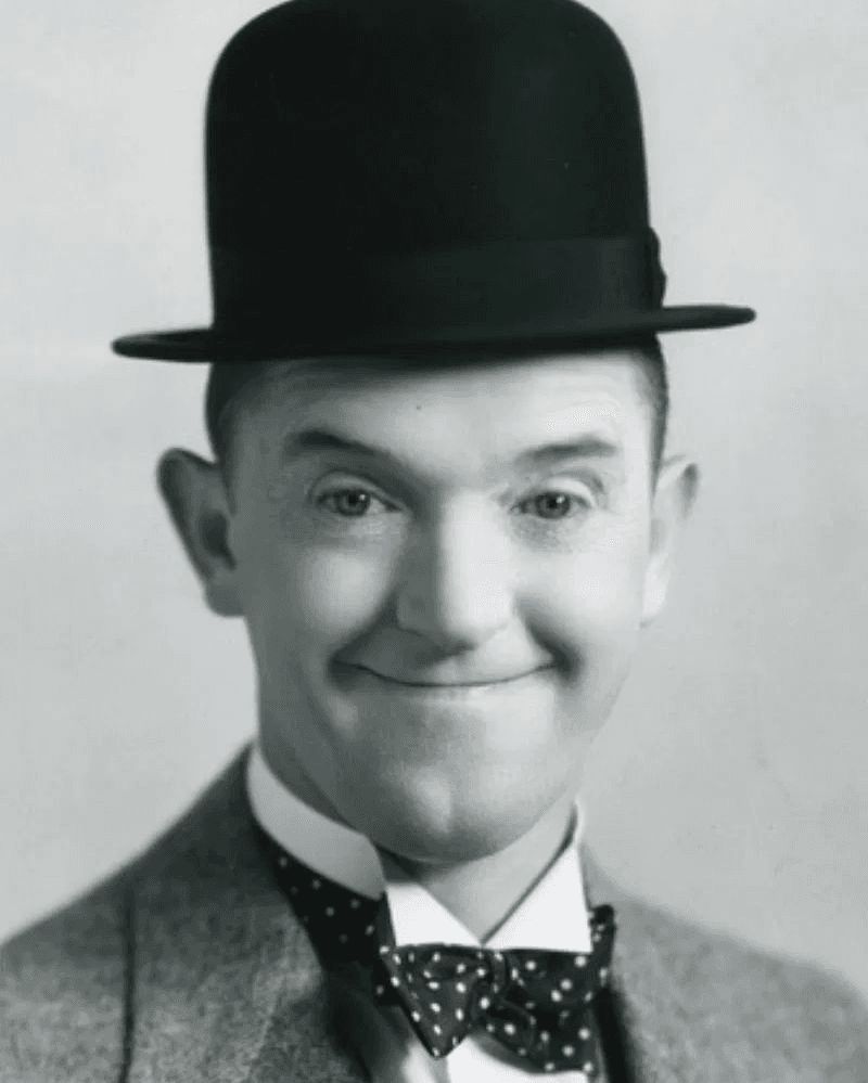 respectsapp's tweet photo. Respects to Stan Laurel, who died on this day (23rd February) in 1965. Instantly recognisable in his trademark hats and squiffy bow tie, Stan appeared in 107 movies, shorts and cameos with his comedy partner Oliver Hardy. RIP Stan 🤍 https://t.co/2CI4P7PFgG