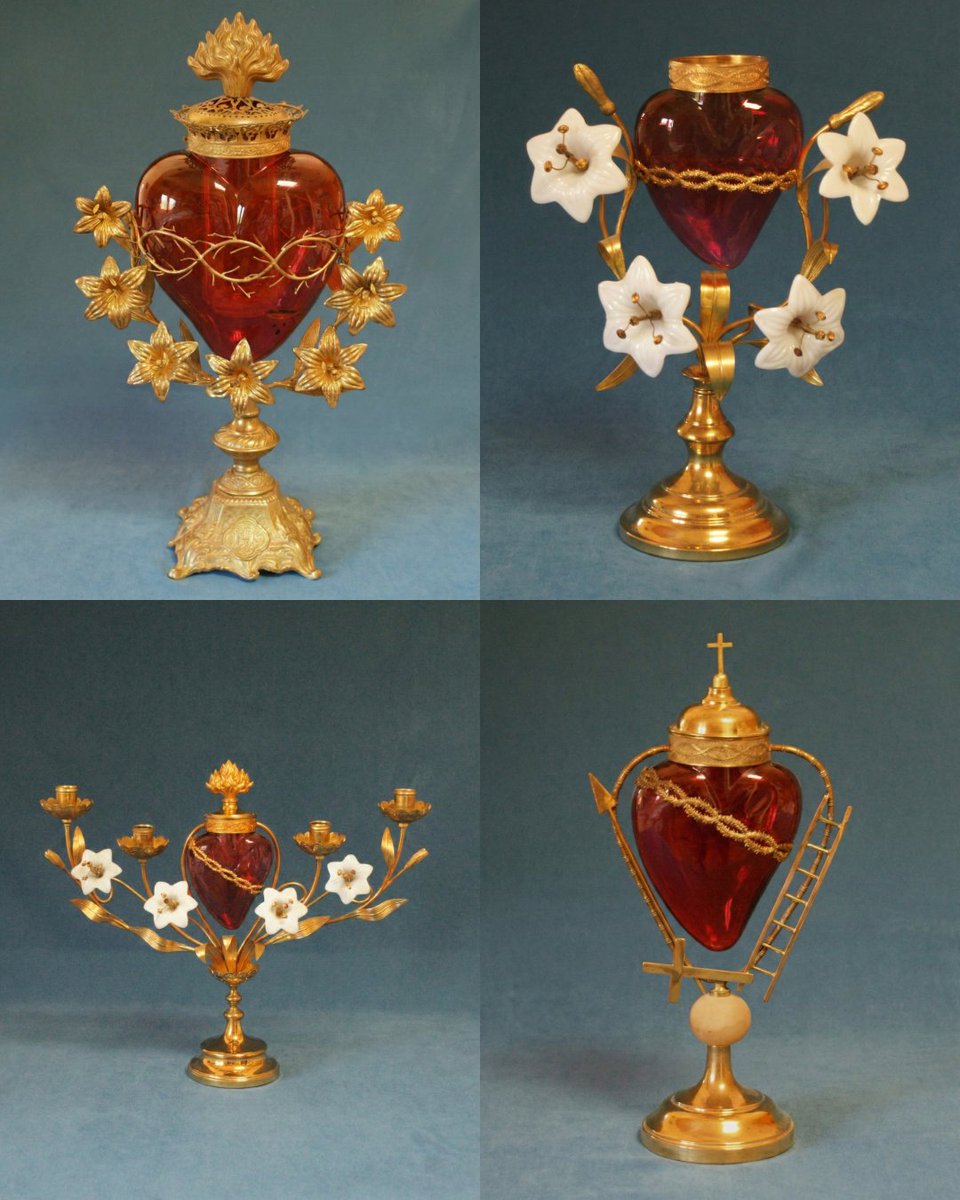 French Sacred Heart votive lamps, 19th century. Medium: Ruby-red glass, gilded brass, and porcelain.

The thorny -- and in most cases, flaming or cross-crowned -- heart motif at the center of these designs is rooted in the religious visions of the 17th-century French nun