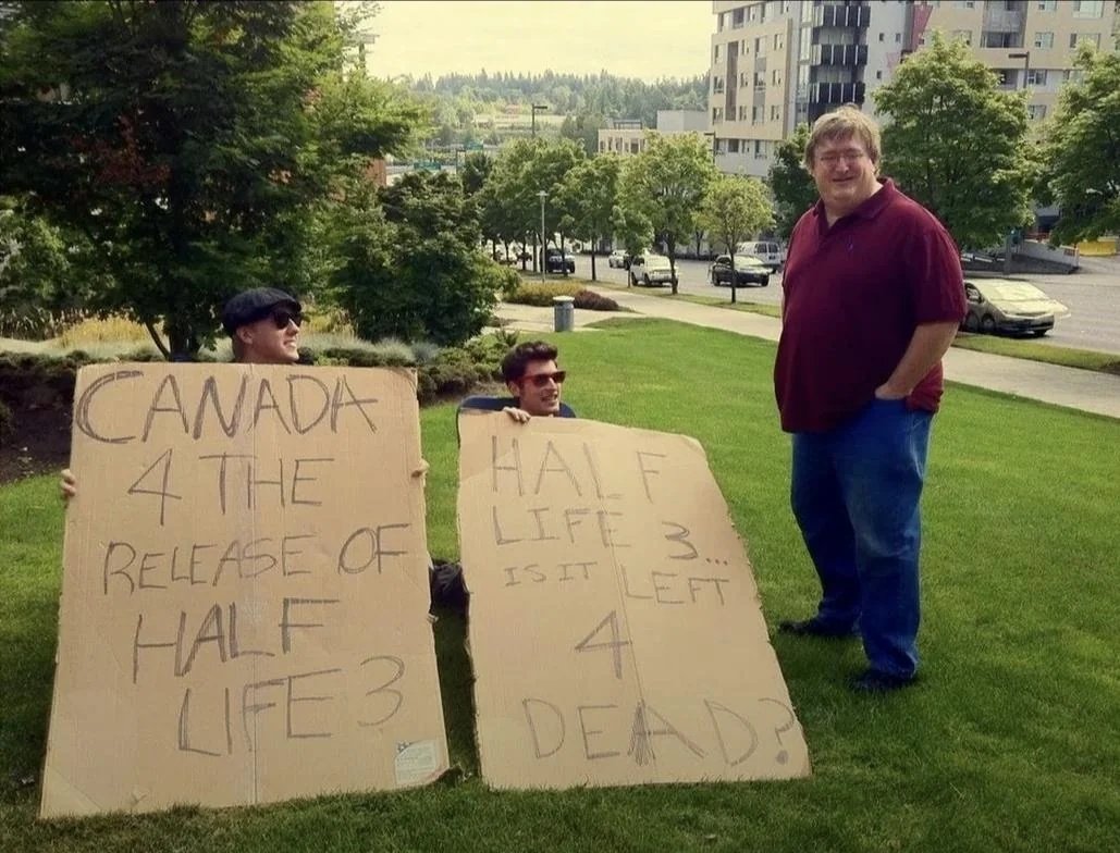 jaksjaksjsj miren lo que encontré, Gabe Newell tomándose una foto con fans protestando por Half-Life 3 afuera de la sede de Valve, en 2011