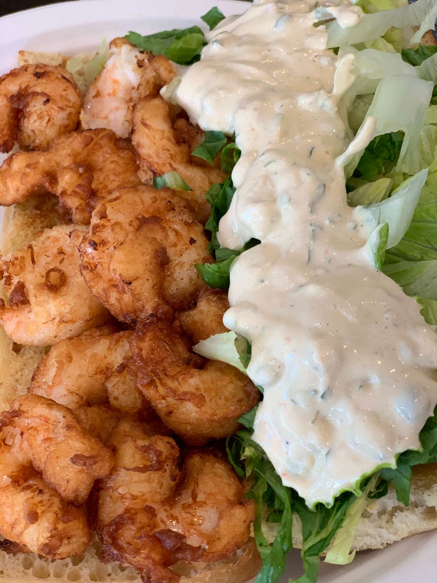 Dive into the irresistible flavors of our Shrimp Po'boy #28! 🍤🥪 Featuring creamy mayo, crunchy battered shrimp, smooth avocado &amp; tangy red onion remoulade. It's a fan favorite for a reason! #CooksTortas #ShrimpLovers #FoodieFave
