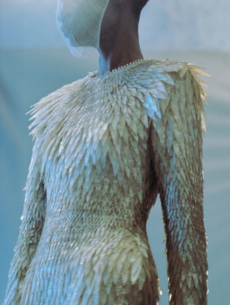 Robert Wun’s “The Storm-born gown” created from Mother of Pearls cut and sharpened to appear like feathers