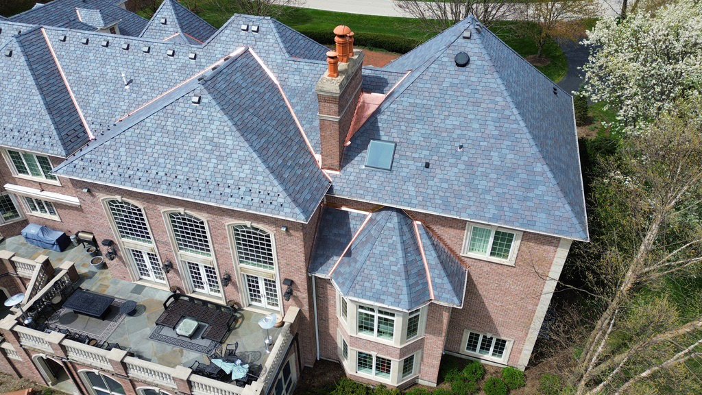ShakeGuys's tweet photo. The Shake Guys Team completed a stunning transformation on this beautiful Inverness home!🏠😍

Our Team installed a premium DaVinci Multi-Width Province Slate composite roofing system in the elegant European color, along with Custom Copper Accents and new Skylights. https://t.co/F9lhIGJn8I
