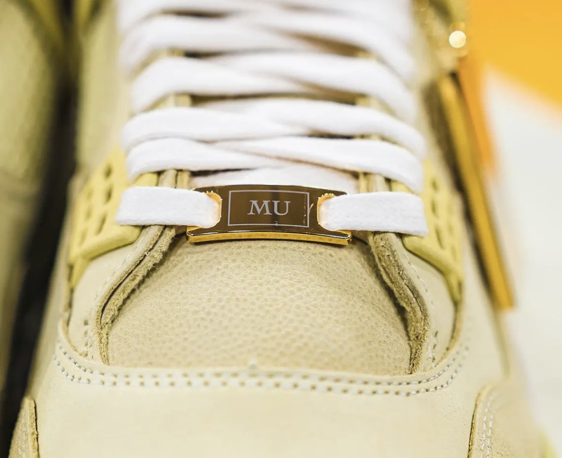 MUOverload's tweet photo. Michael Jordan celebrates Tyler Reddick’s (@TylerReddick) Autotrader 400 victory in a pair of Air Jordan 4 @MarquetteWBB player exclusive shoes on February 22, 2026 #mubb https://t.co/yIrkuexeqL