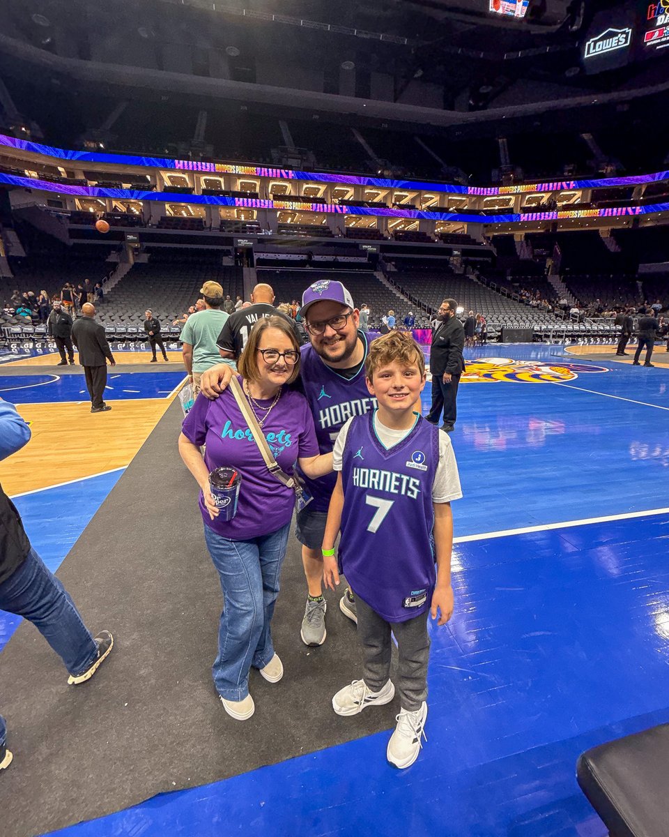 MecklenburgEMS's tweet photo. A different kind of Friday night lights… no sirens involved. 🏀 Our team (and their families!) enjoyed courtside warmups, cheered from the stands, and even took a free throw on the court. Huge thanks to the Hornets for Community Hero Night! 💙 #MeckMedic #EMS https://t.co/ZULIZKgXXf