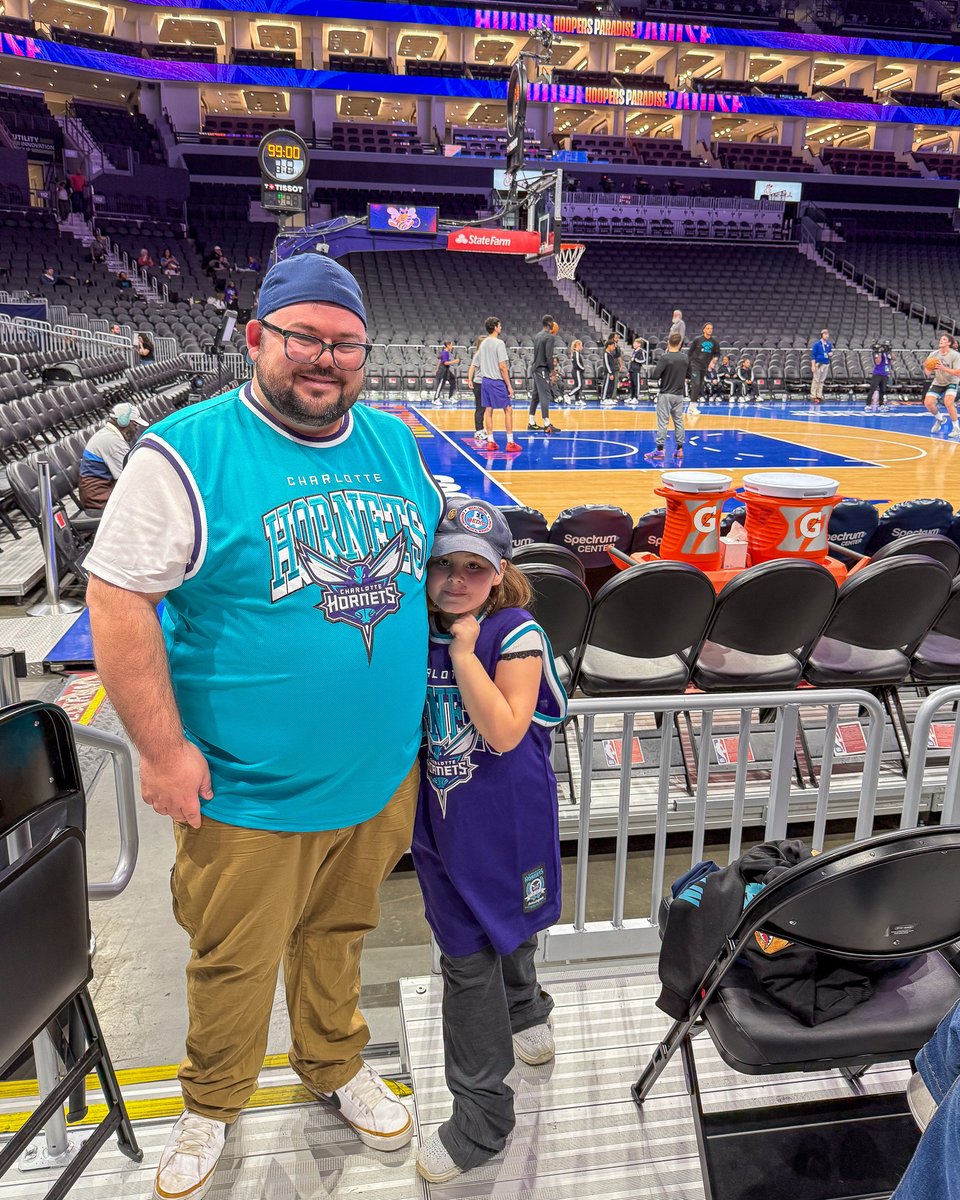 MecklenburgEMS's tweet photo. A different kind of Friday night lights… no sirens involved. 🏀 Our team (and their families!) enjoyed courtside warmups, cheered from the stands, and even took a free throw on the court. Huge thanks to the Hornets for Community Hero Night! 💙 #MeckMedic #EMS https://t.co/ZULIZKgXXf