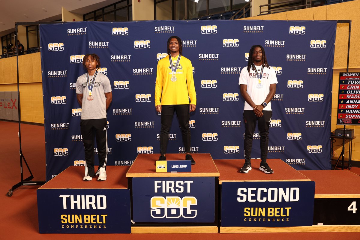 SunBelt's tweet photo. 𝗪𝗔𝗥𝗗'𝗦 𝗪𝗢𝗥𝗟𝗗.

DeAundre Ward from @SouthernMissTF earned the top spot on the podium in the long jump to claim the first gold medal of the 2026 Men’s Indoor #SunBeltTF Championship. ☀️👟 https://t.co/IxKXb6lwOz