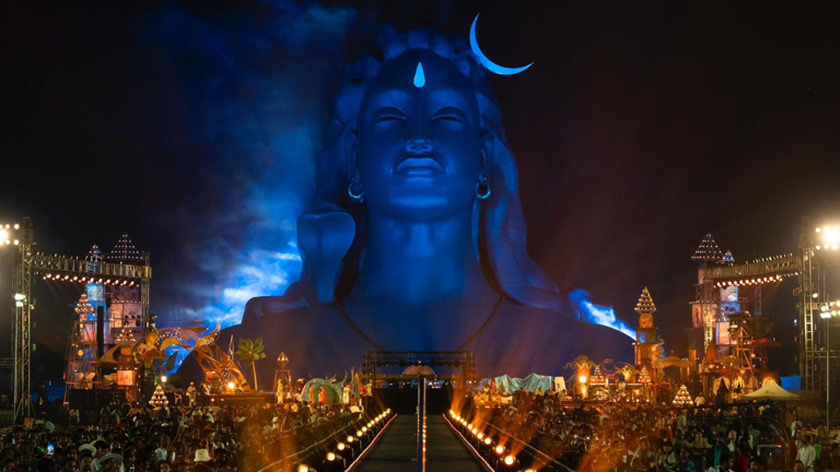 bigfundu's tweet photo. 1. “Devotion has turned into spectacle and performance”

Article’s point: Bhajans and chanting have moved from intimate circles into stadiums with LED walls, DJs, lasers, and choreographed crowds. Spirituality is framed as entertainment.

What the author has missed is scale ≠ superficiality.

This is very important to understand. Historically, spiritual movements always adapt to available technology:

•Buddha used public gatherings
•Bhakti saints used folk music for their reach 
•Churches adopted organs and megaphones
•Today’s Gurus use livestreams and stadiums

If millions can access a meditation or a mantra because of microphones and YouTube, that’s not dilution - that is actually democratization.

Sadhguru often emphasizes that tools are neutral; it’s how you use them that matters. 

A microphone doesn’t cancel transcendence any more than printing presses cancel books.

2/🧵