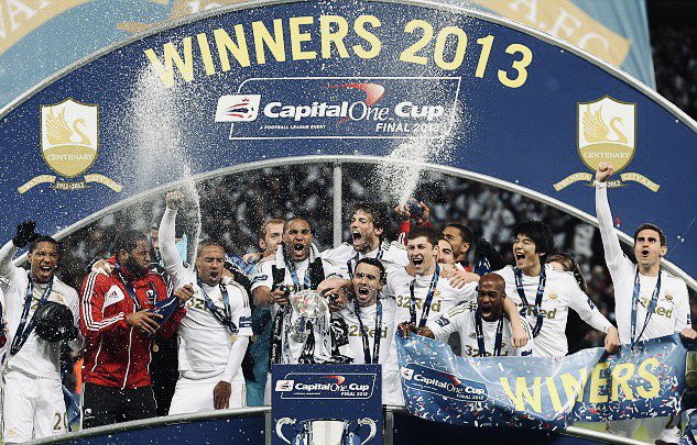 JordanWebber96's tweet photo. Thirteen years ago today…

Michael Laudrup’s Swansea City went to Wembley and defeated Bradford 5-0 in the Capital One Cup final to win their first major trophy in the clubs history.

Dyer - 16’
Michu - 40’
Dyer - 47’
De Guzman - 59’
De Guzman - 91’

History made. 🦢🏆 https://t.co/CTcLolo7Zy