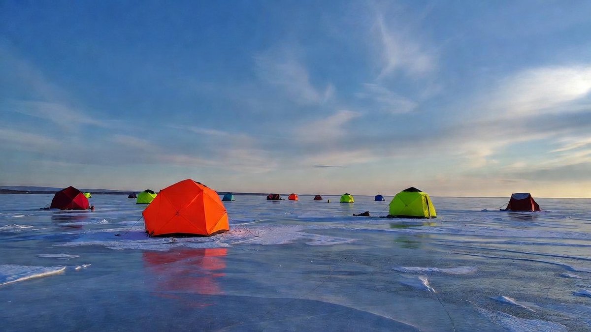 A Peaceful Escape - 25

Vibrant tents on a frozen lake under a twilight sky, evoking isolation and calm in a winter landscape.

- Image by Grok