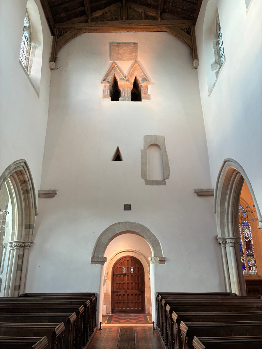 zarahandley's tweet image. Left-The west wall of the nave, foundation stone and two unique Anglo Saxon windows with triangular heads, doorway is also simple Anglo Saxon design 
Right-present chancel with blocked Anglo Saxon doorway 
📷St.Mary’s Deerhurst, Gloucestershire